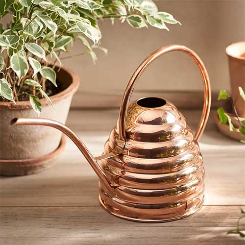 luxurious-gift-for-plant-lover-copper-beehive-watering-can